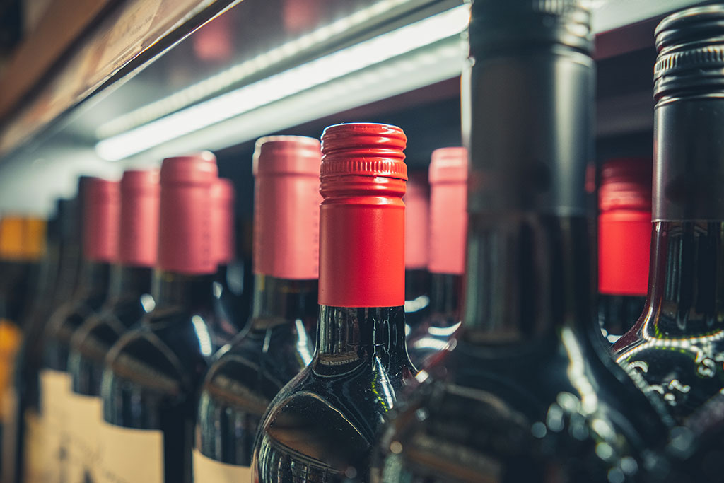 Red Wine Bottles: Close-up of Bottle Necks