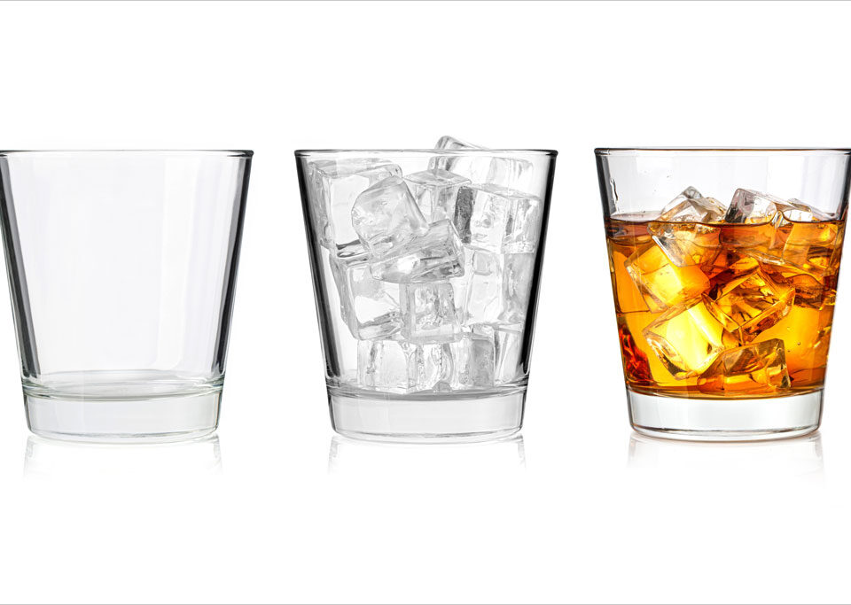 Booze, politics & law: Glasses symbolize debate on cutting the legislative cord for alcohol.